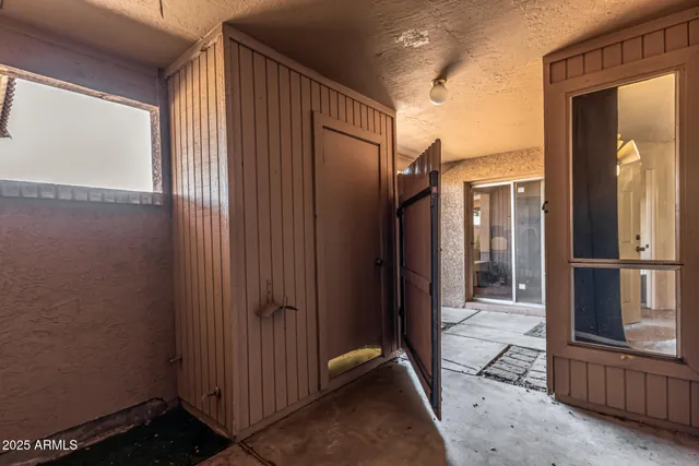an ocean view with a table and chairs