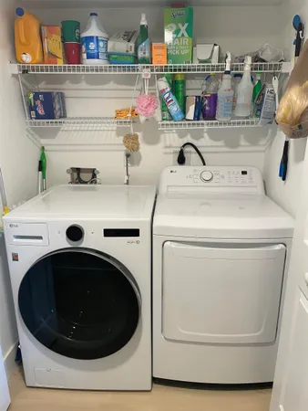 a view of a swimming pool with a yard