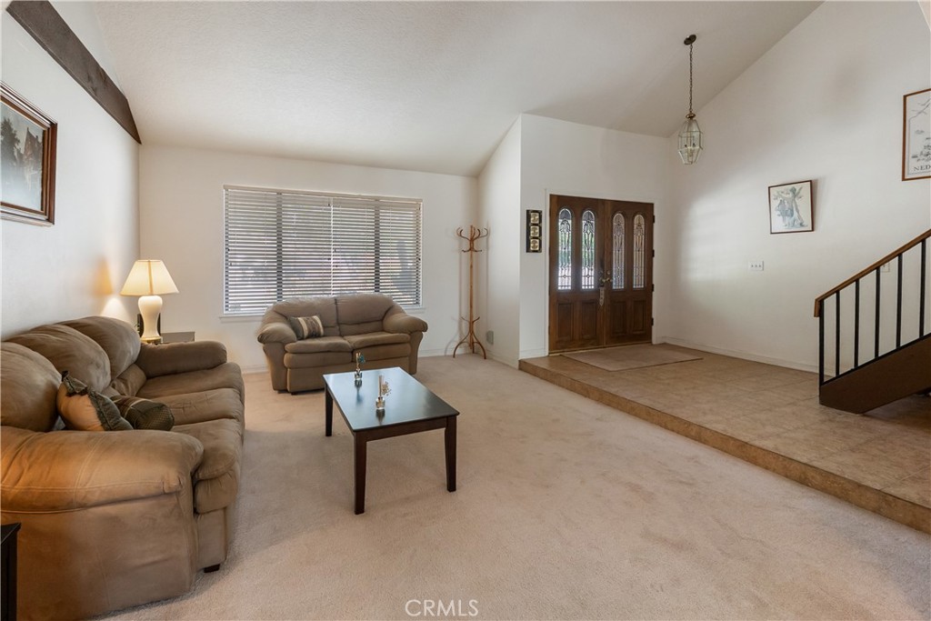 17656 Mockingbird Hill Circle Riverside, CA 92504 - Photo 8 of 49 a living room with furniture and a window