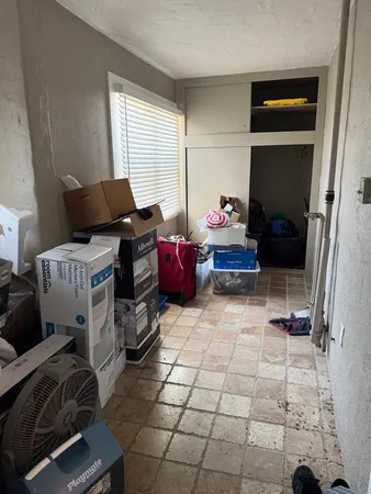 a bathroom with a toilet and a sink