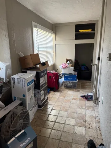a bathroom with a toilet and a sink