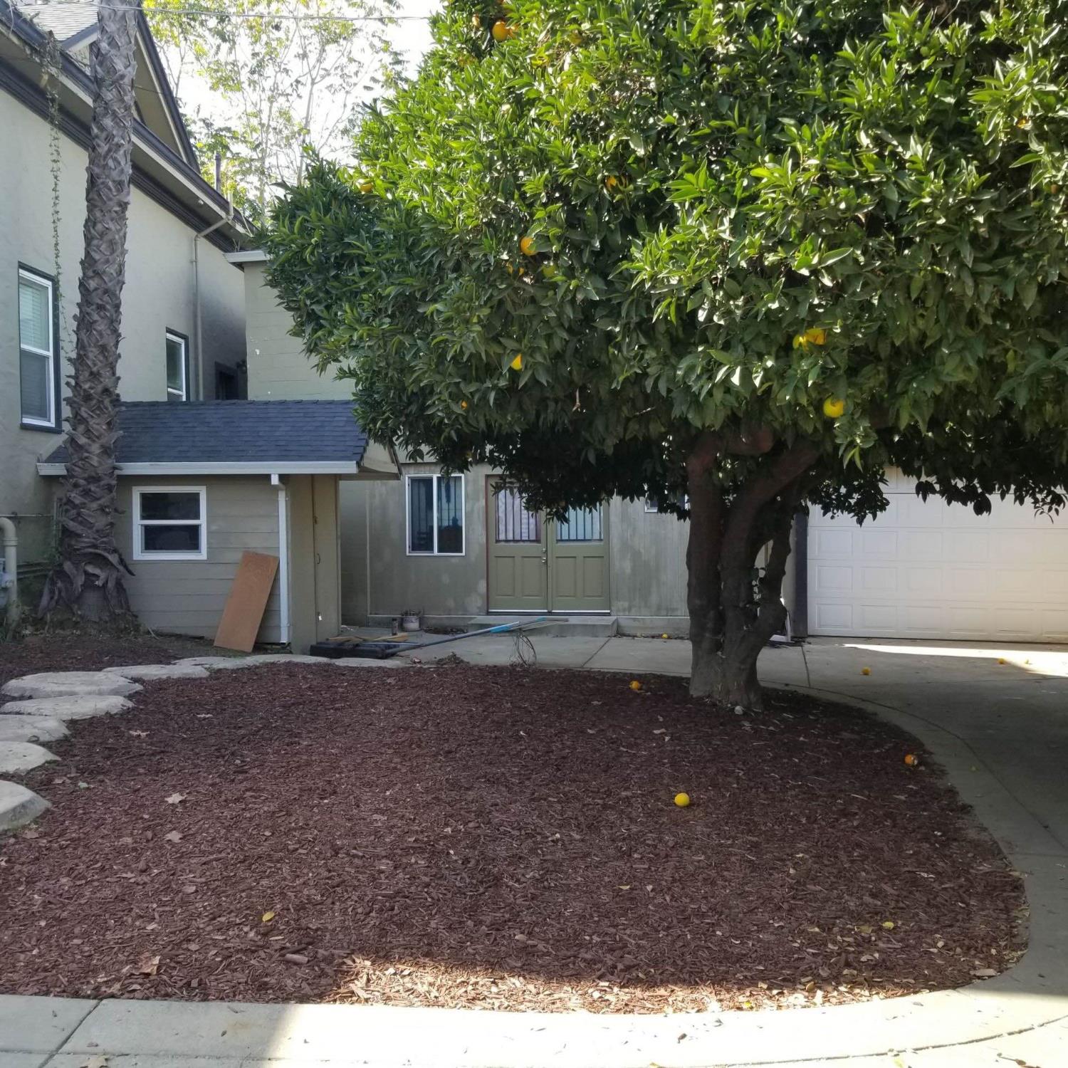 533 Reeves Avenue Yuba City, CA 95991 - Photo 9 of 48 a view of a house with a tree