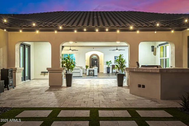 a view of hall way with furniture