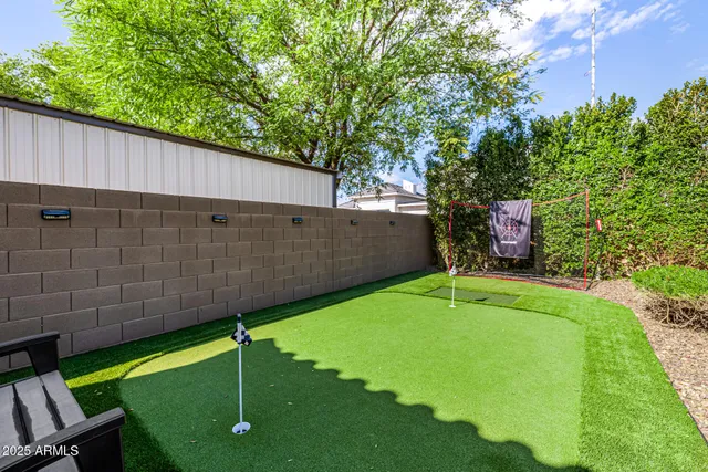 a outdoor living space with furniture and garden view