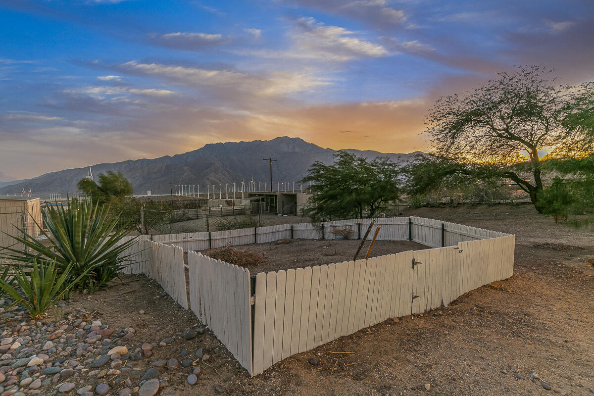 61895 Smoke Tree Road North Palm Springs, CA 92258 - Photo 21 of 88 a view of a backyard with sitting area