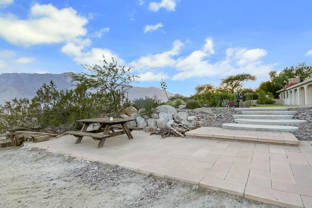 61895 Smoke Tree Road North Palm Springs, CA 92258 - Photo 69 of 88 a view of a terrace with sitting area