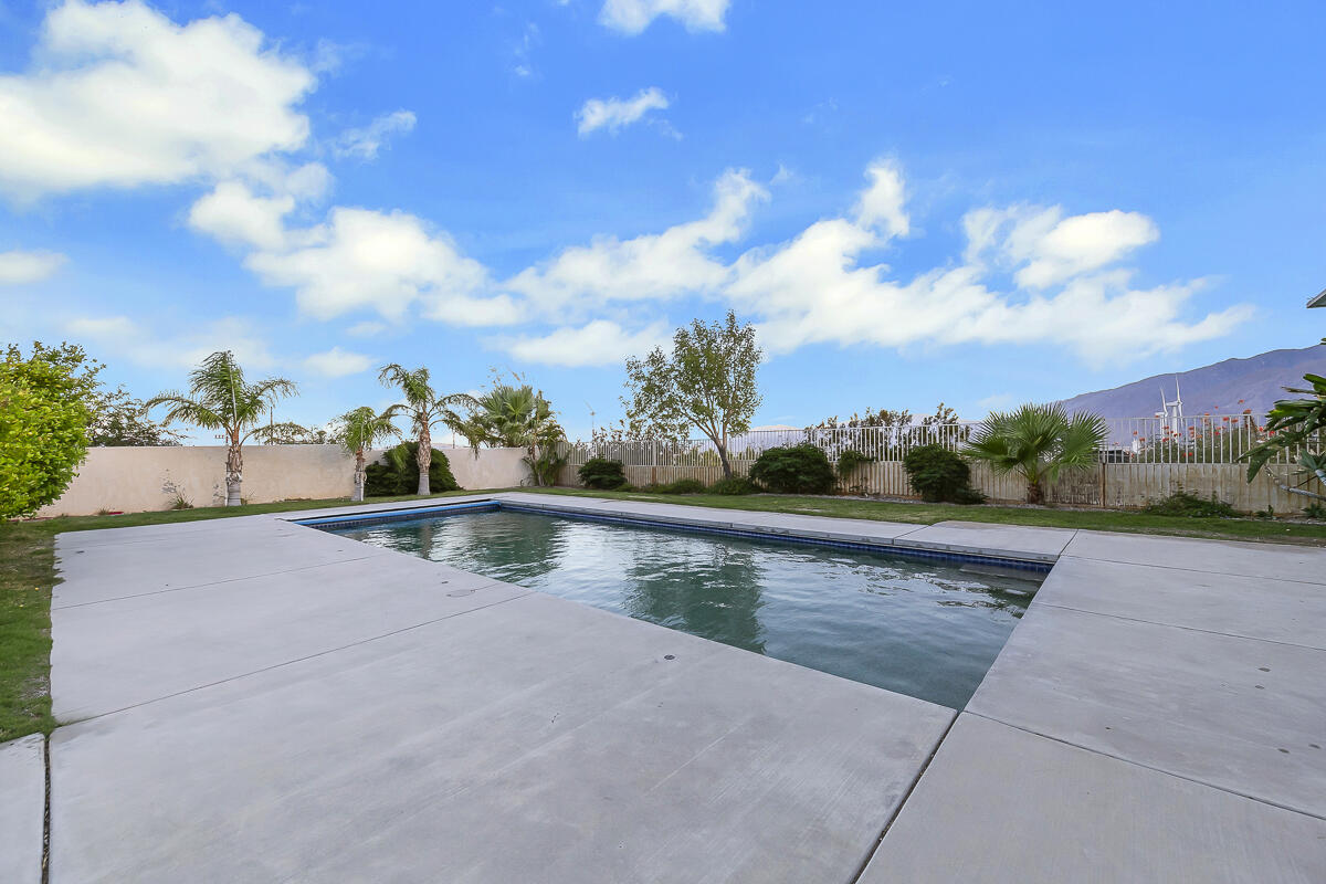 61895 Smoke Tree Road North Palm Springs, CA 92258 - Photo 76 of 88 a view of swimming pool with a yard