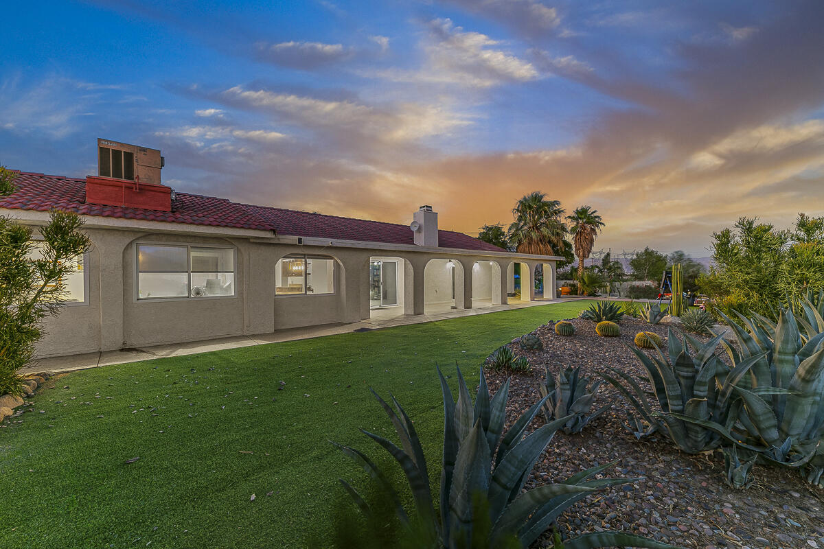 61895 Smoke Tree Road North Palm Springs, CA 92258 - Photo 8 of 88 a view of a house with a yard