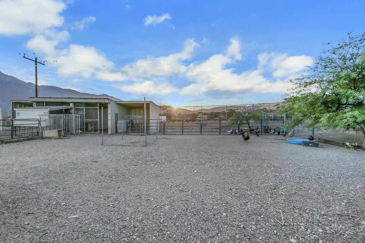 61895 Smoke Tree Road North Palm Springs, CA 92258 - Photo 83 of 88 a view of a house with a backyard