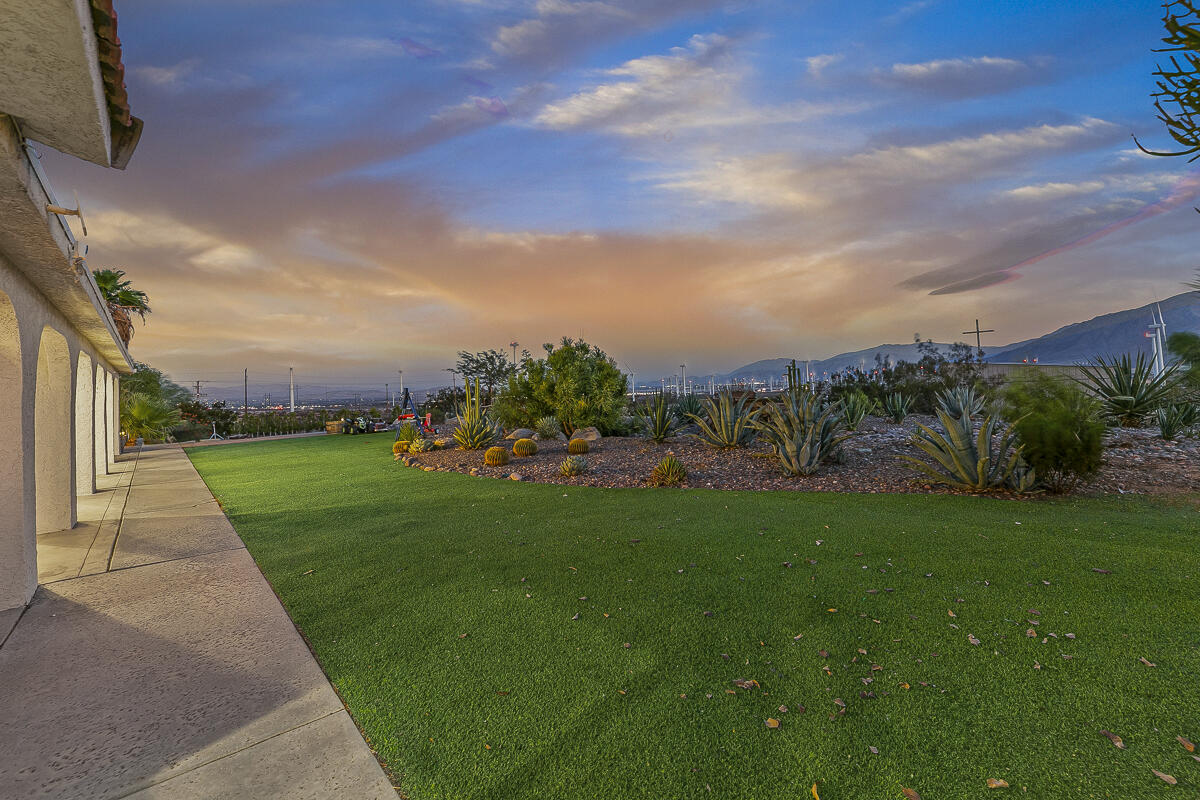 61895 Smoke Tree Road North Palm Springs, CA 92258 - Photo 9 of 88 a view of building with garden