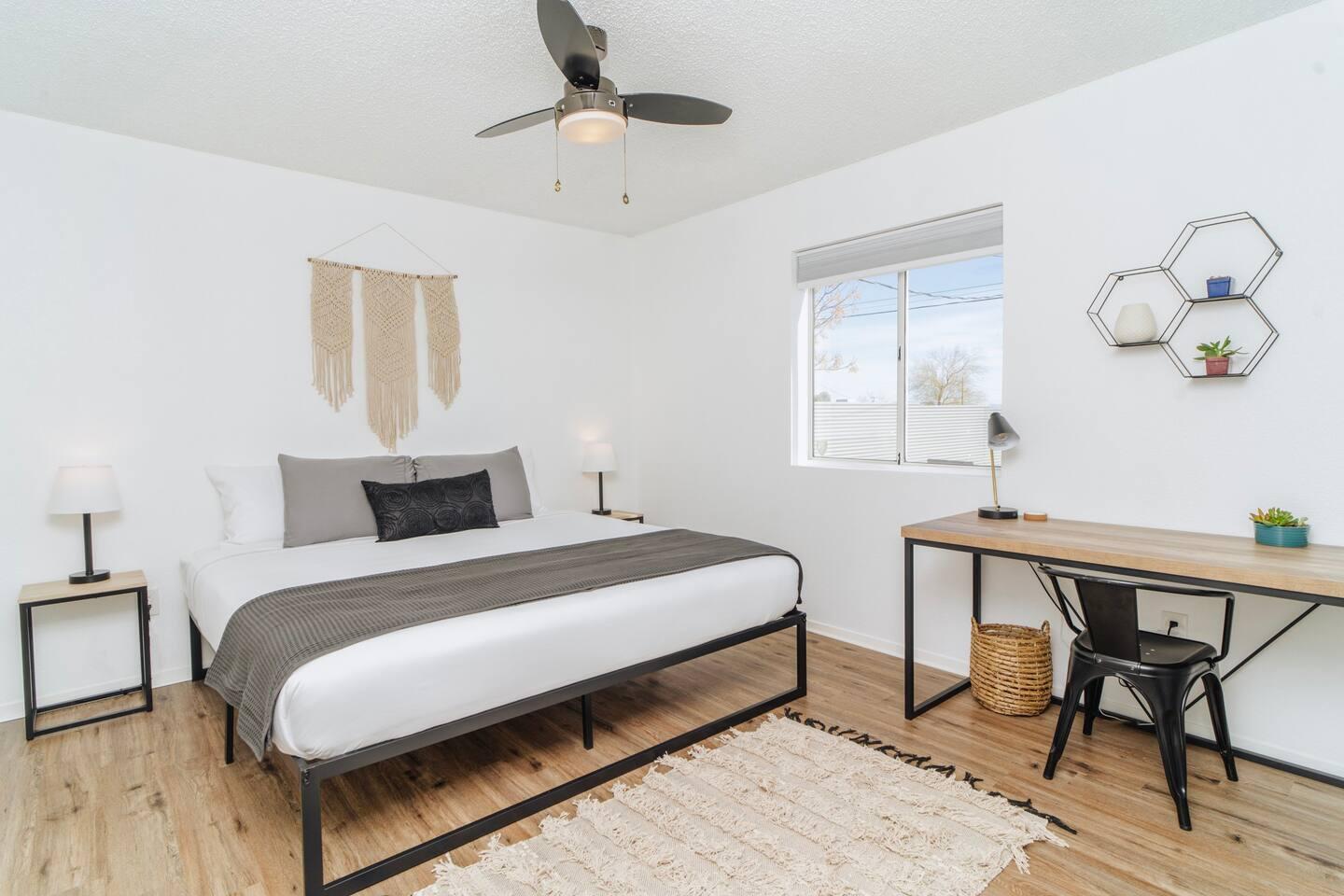 6635 Morongo Road Twentynine Palms, CA 92277 - Photo 16 of 31 a bedroom with a bed and a table