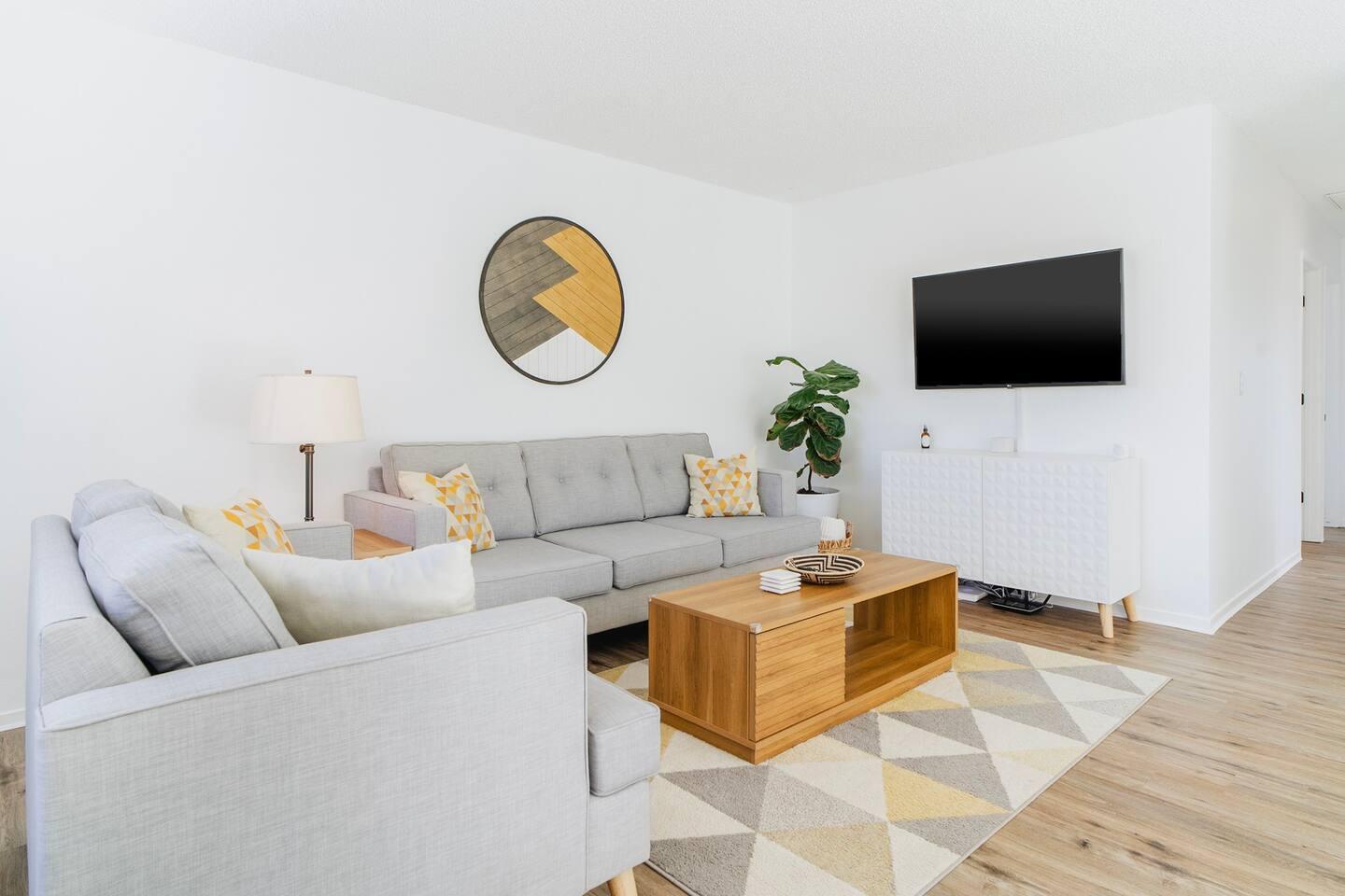 6635 Morongo Road Twentynine Palms, CA 92277 - Photo 6 of 31 a living room with furniture and a flat screen tv