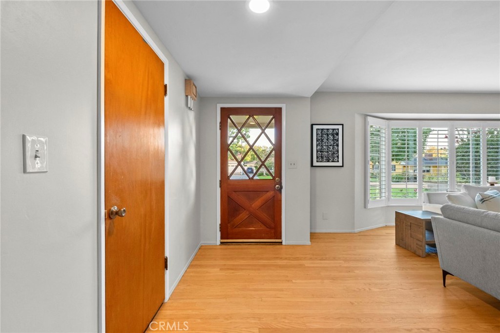 1101 Sharon Road Santa Ana, CA 92706 - Photo 11 of 53 Original front door and coat closet. Recessed LED lights.