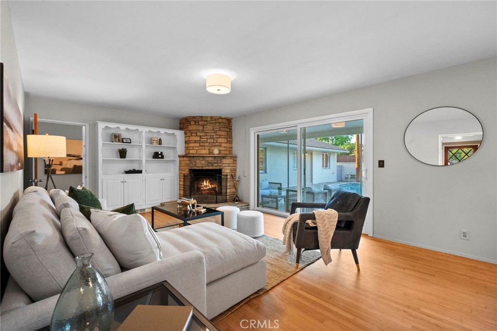 1101 Sharon Road Santa Ana, CA 92706 - Photo 13 of 53 Cozy corner fireplace with built-ins.