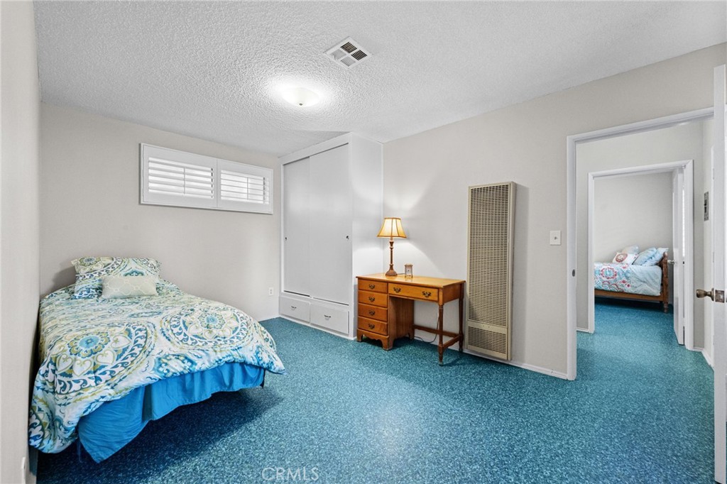 1101 Sharon Road Santa Ana, CA 92706 - Photo 30 of 53 Bedroom #3 with Jack & Jill bath. Original vinyl floors are so cool.