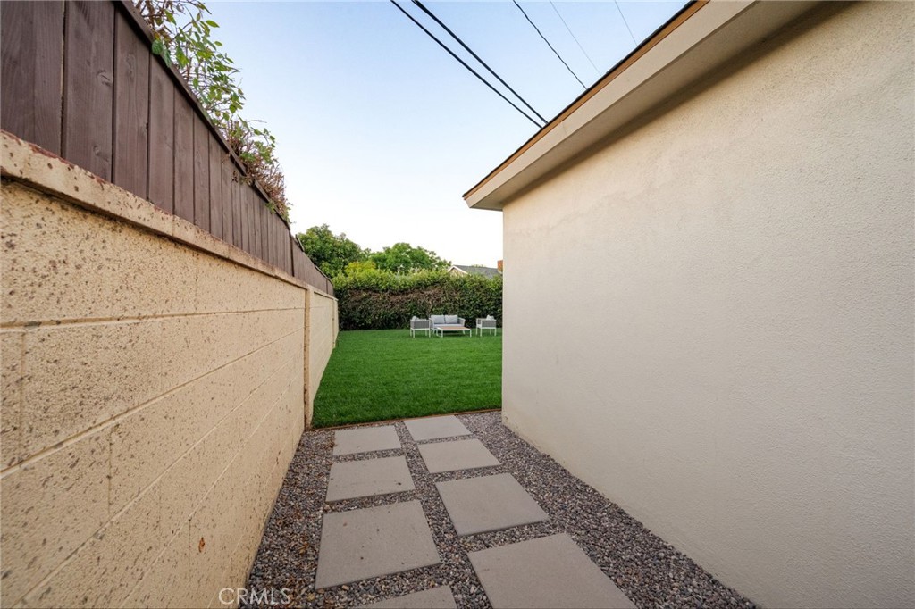 1101 Sharon Road Santa Ana, CA 92706 - Photo 45 of 53 Path to back yard behind garage.
