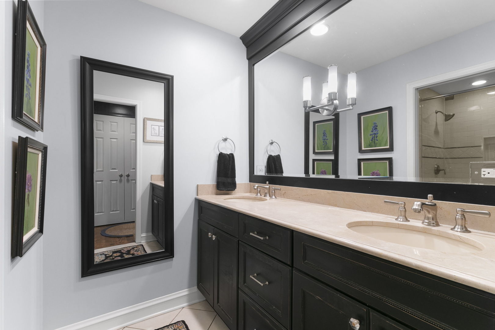 478 Uvedale Road Riverside, IL 60546 - Photo 15 of 40 a bathroom with a double vanity sink and a mirror