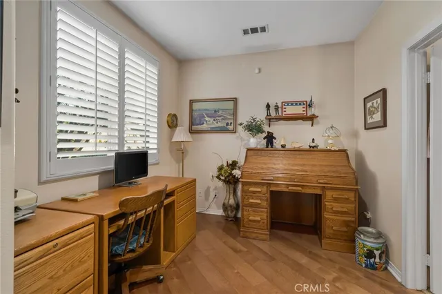 a view of kitchen with sink stove and refrigerator