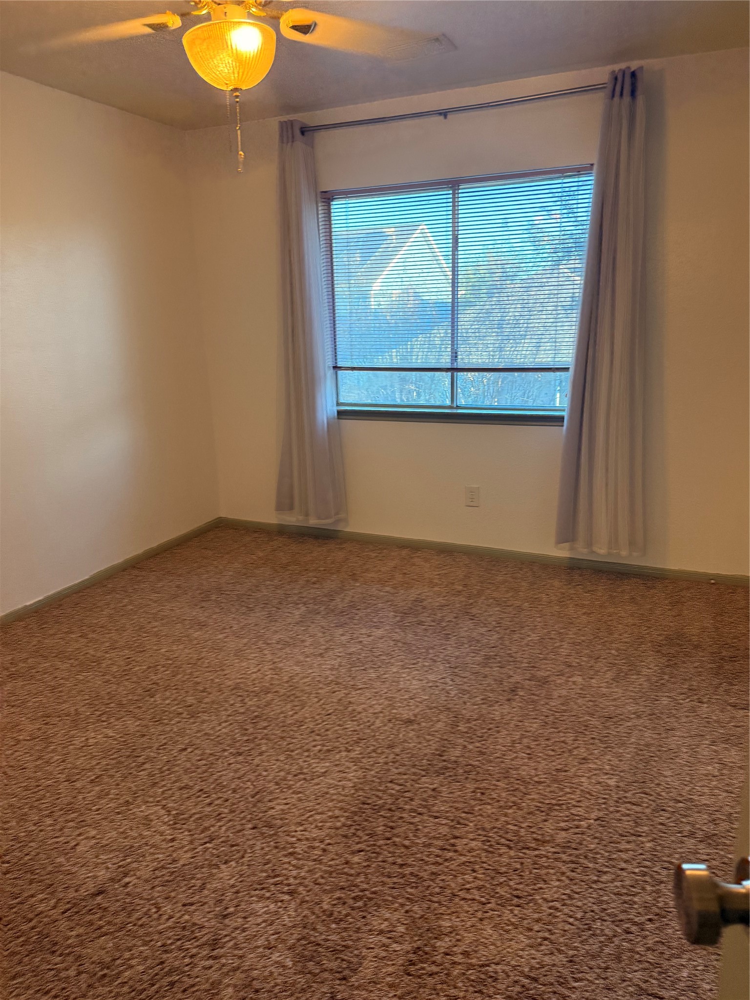 5619 Roserock Lane Spring, TX 77379 - Photo 11 of 14 a view of an empty room with a window