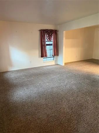 a view of a livingroom with a staircase