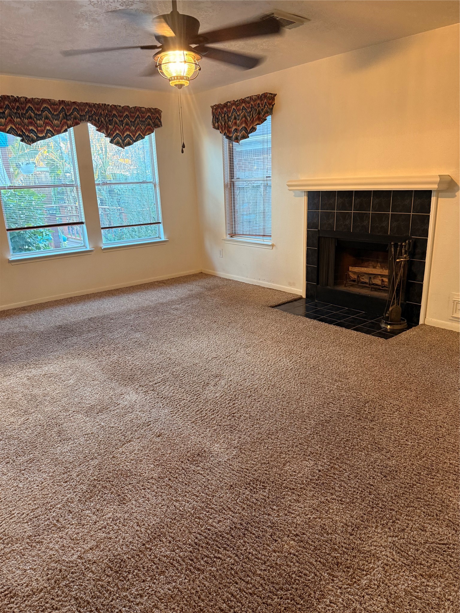 5619 Roserock Lane Spring, TX 77379 - Photo 5 of 14 a view of empty room with a fireplace