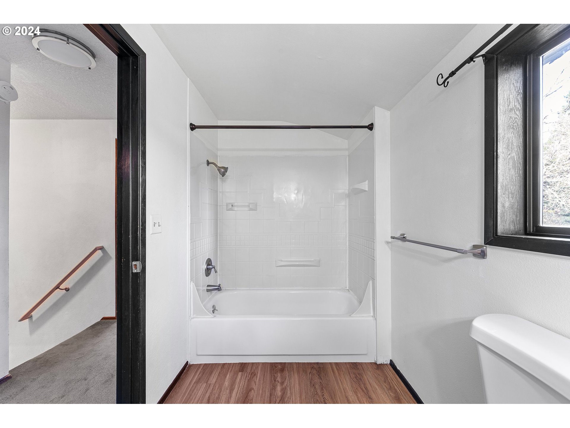 4091 Bell Avenue Eugene, OR 97402 - Photo 21 of 29 a bathroom with a shower and a toilet
