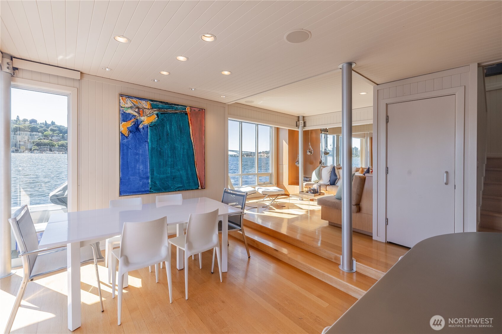 2017 Fairview Avenue East, Unit I Seattle, WA 98102 - Photo 12 of 34 a living room with fireplace furniture and a large window