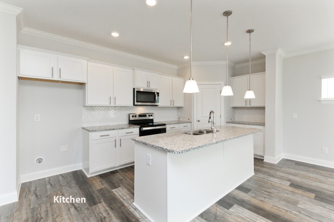 617 Castle Road West Mount Juliet, TN 37122 - Photo 8 of 23 a kitchen with white cabinets appliances and sink