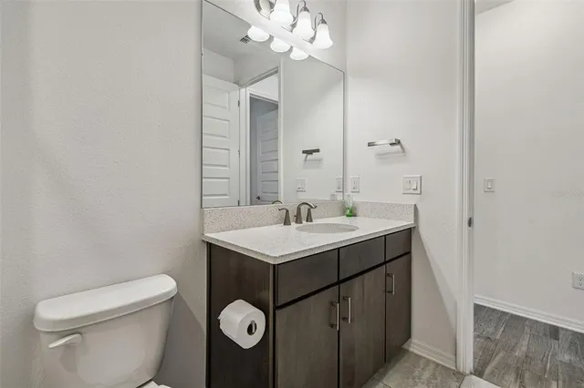 a view of bathroom with washer and dryer