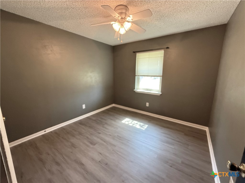 809 Michelle Drive Copperas Cove, TX 76522 - Photo 11 of 12 an empty room with a window and a fan