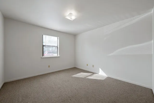 an empty room with a window
