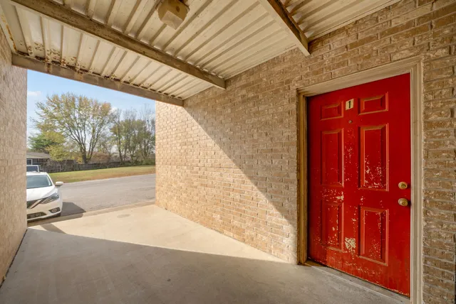 a bathroom with a bathtub and window