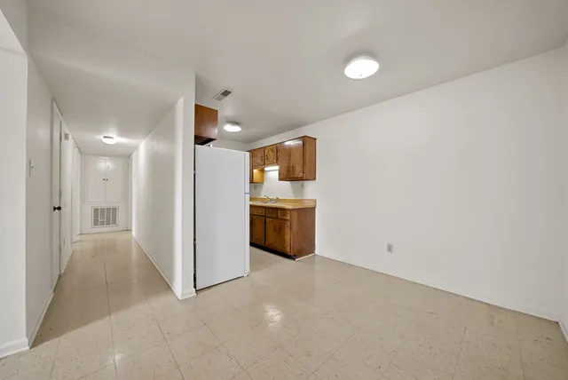a view of a kitchen with a sink