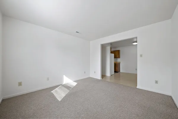 a view of a room with an empty space