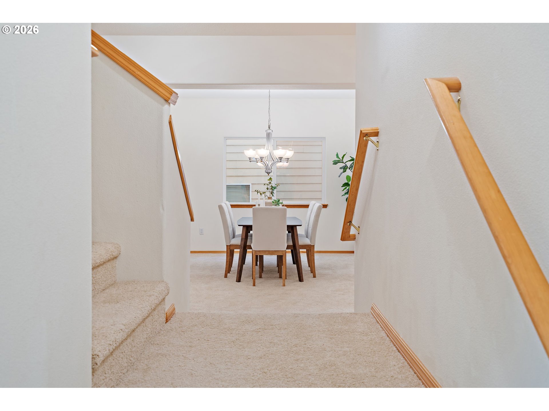 15460 Southwest 145th Terrace Tigard, OR 97224 - Photo 11 of 45 a dining room with furniture and chandelier