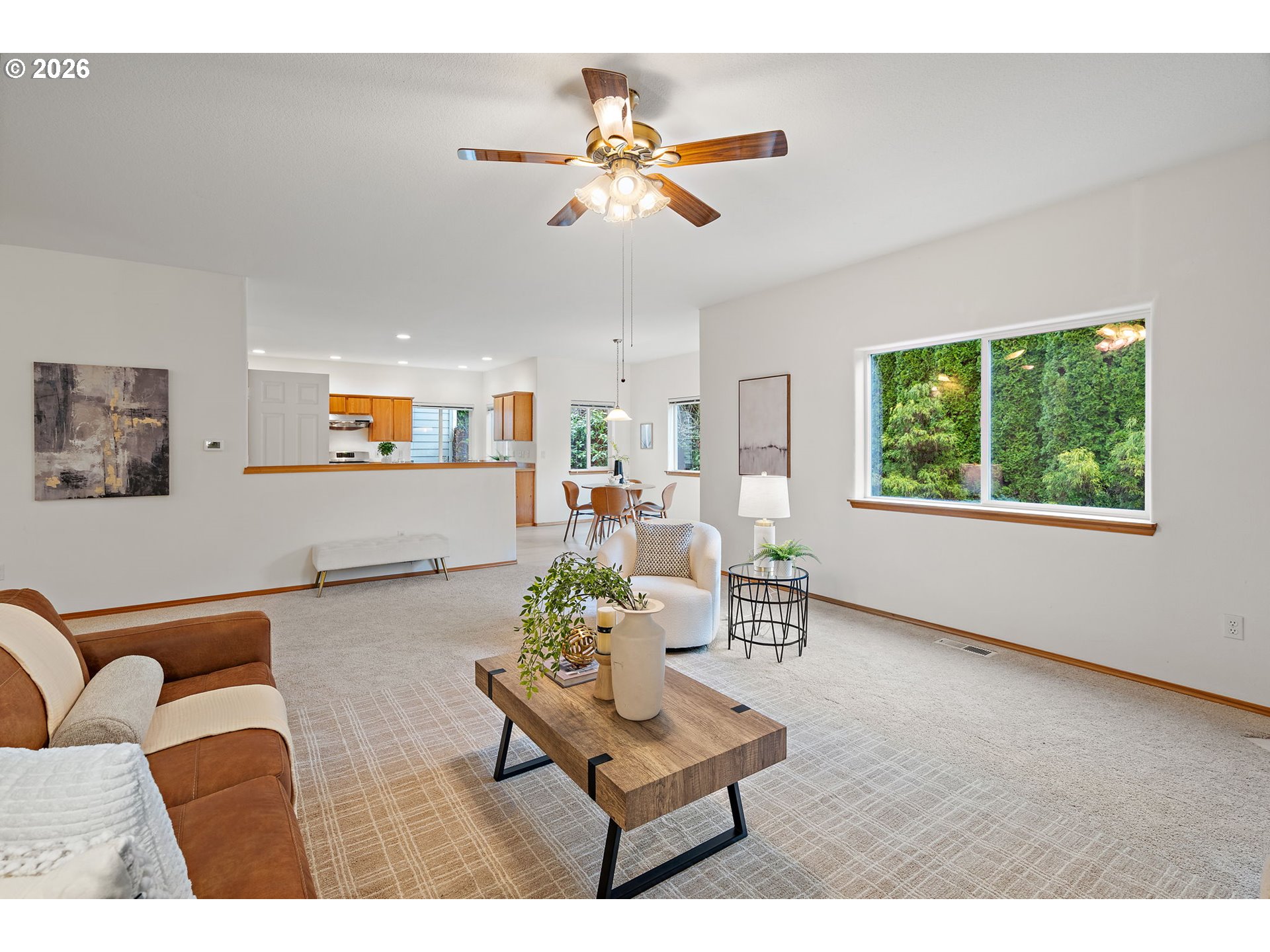 15460 Southwest 145th Terrace Tigard, OR 97224 - Photo 15 of 45 a living room with furniture and a window