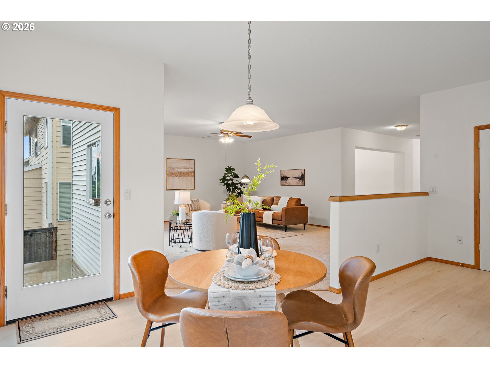 15460 Southwest 145th Terrace Tigard, OR 97224 - Photo 17 of 45 a dining room with furniture and wooden floor