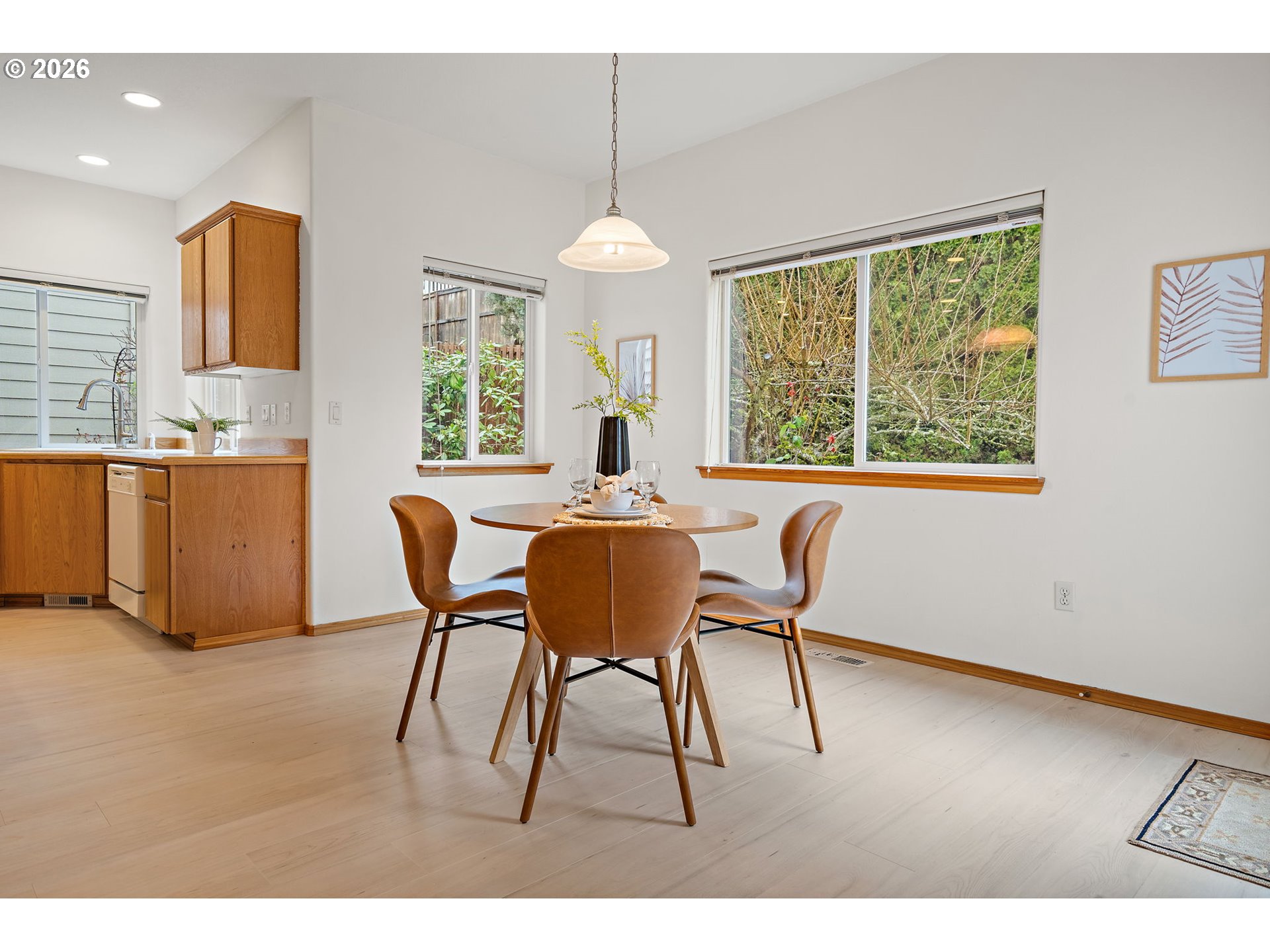 15460 Southwest 145th Terrace Tigard, OR 97224 - Photo 18 of 45 a dining room with furniture and window