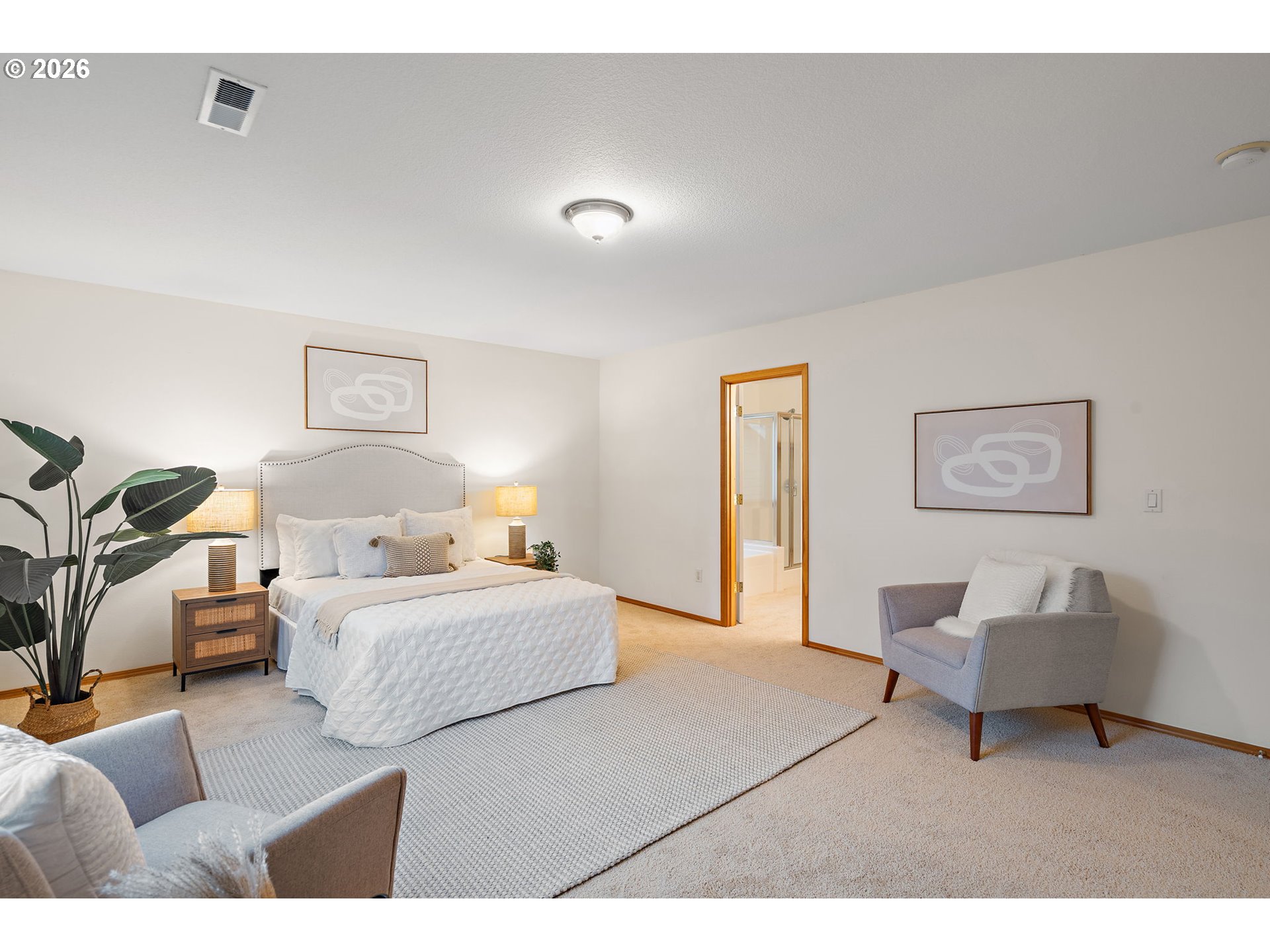 15460 Southwest 145th Terrace Tigard, OR 97224 - Photo 30 of 45 a bedroom with furniture and a bed