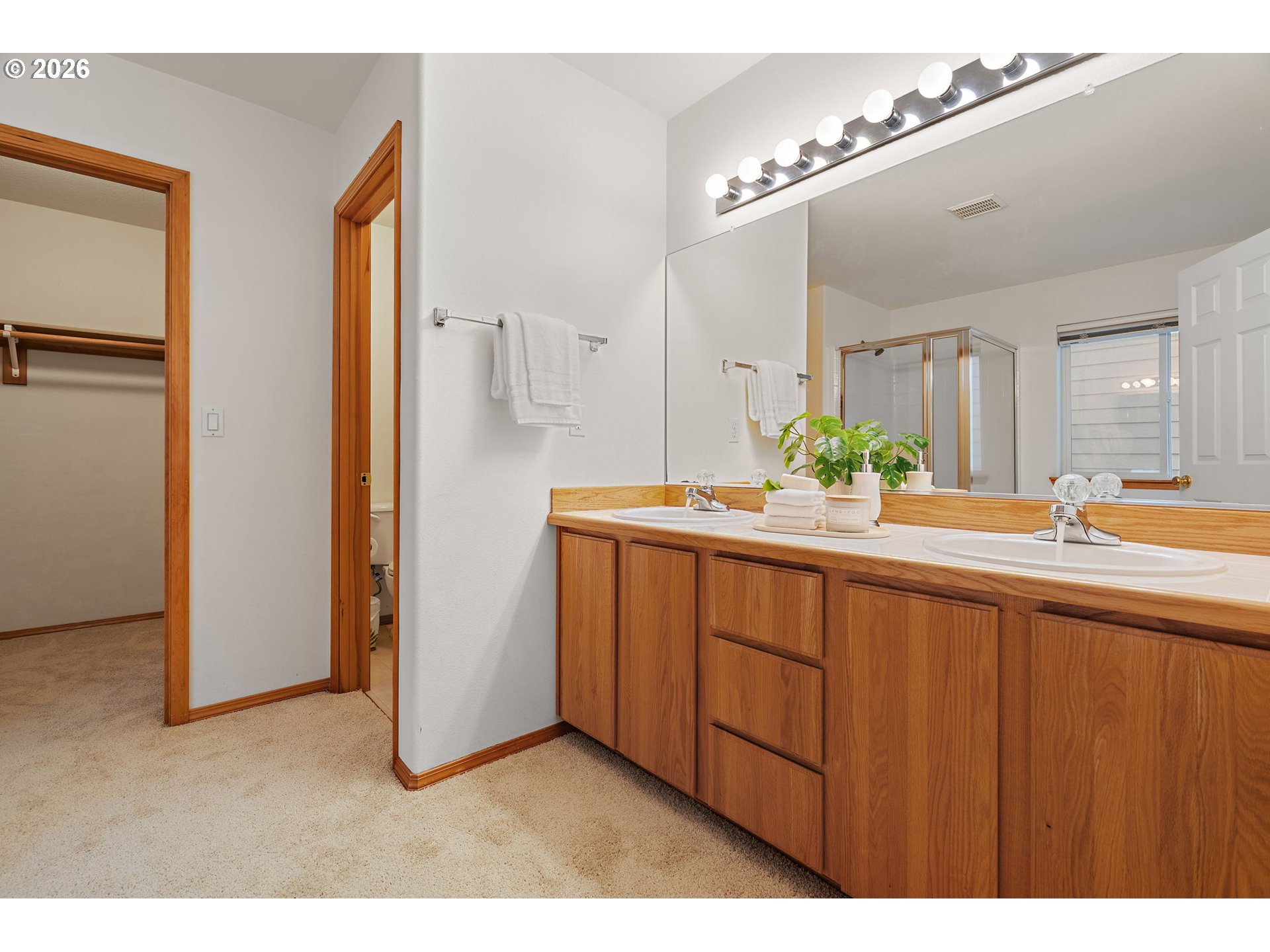 15460 Southwest 145th Terrace Tigard, OR 97224 - Photo 33 of 45 a bathroom with a sink and a mirror