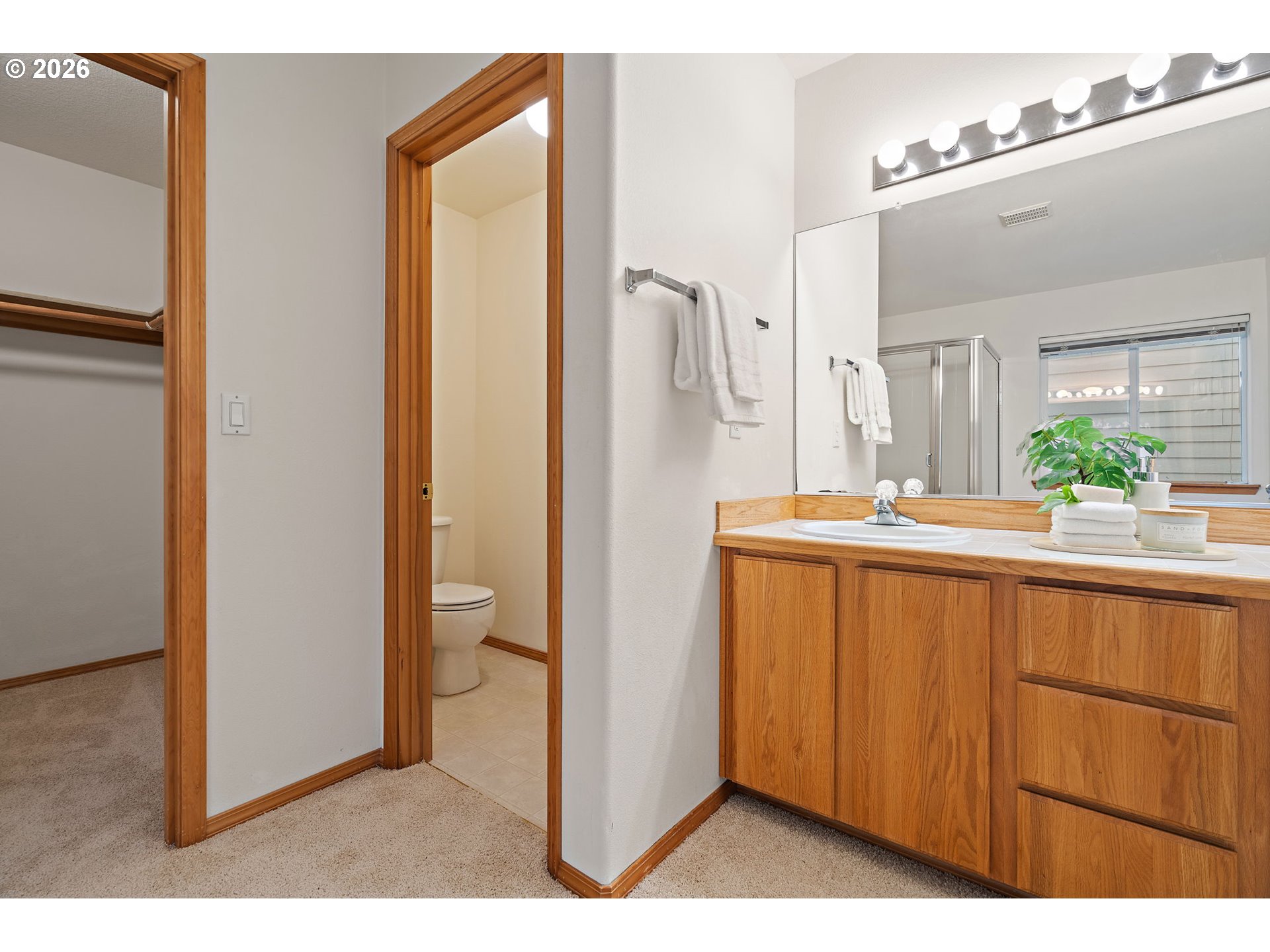 15460 Southwest 145th Terrace Tigard, OR 97224 - Photo 34 of 45 a bathroom with a sink and a mirror
