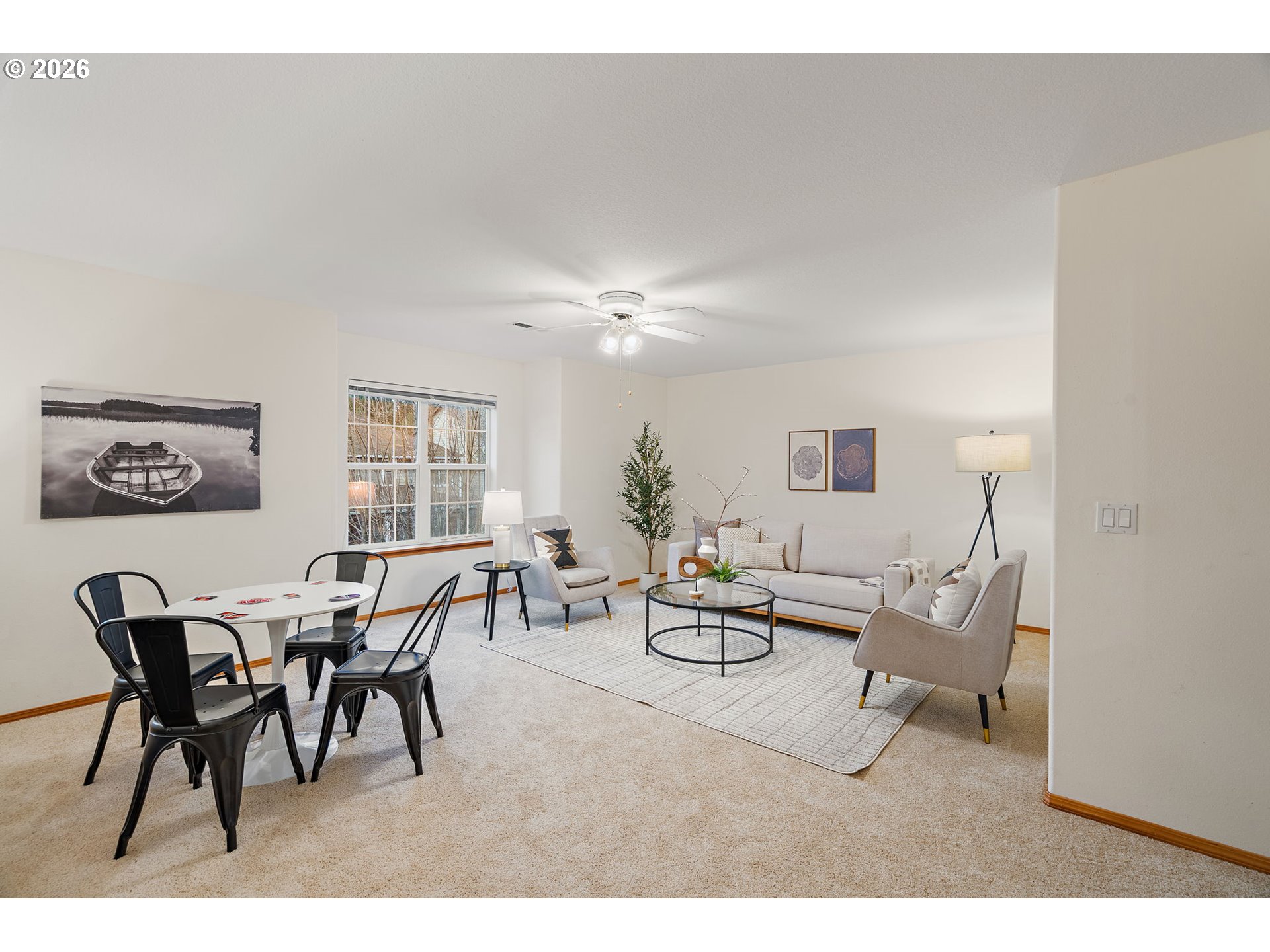 15460 Southwest 145th Terrace Tigard, OR 97224 - Photo 40 of 45 a living room with furniture and a dining table