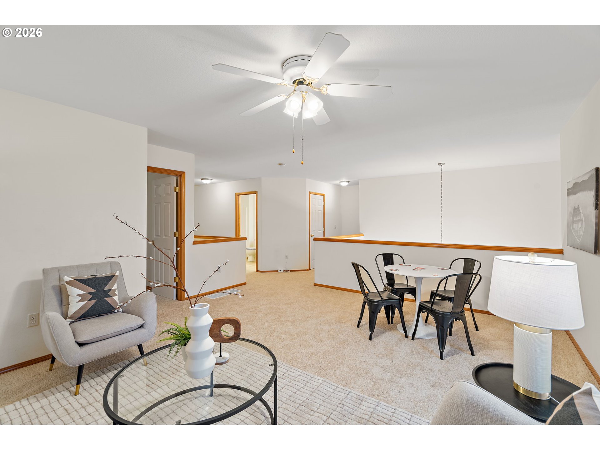 15460 Southwest 145th Terrace Tigard, OR 97224 - Photo 41 of 45 a living room with furniture and a chandelier