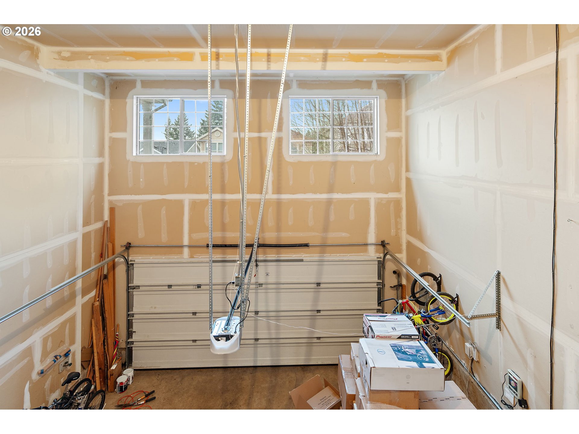 15460 Southwest 145th Terrace Tigard, OR 97224 - Photo 45 of 45 a view of wooden floor and windows in a room