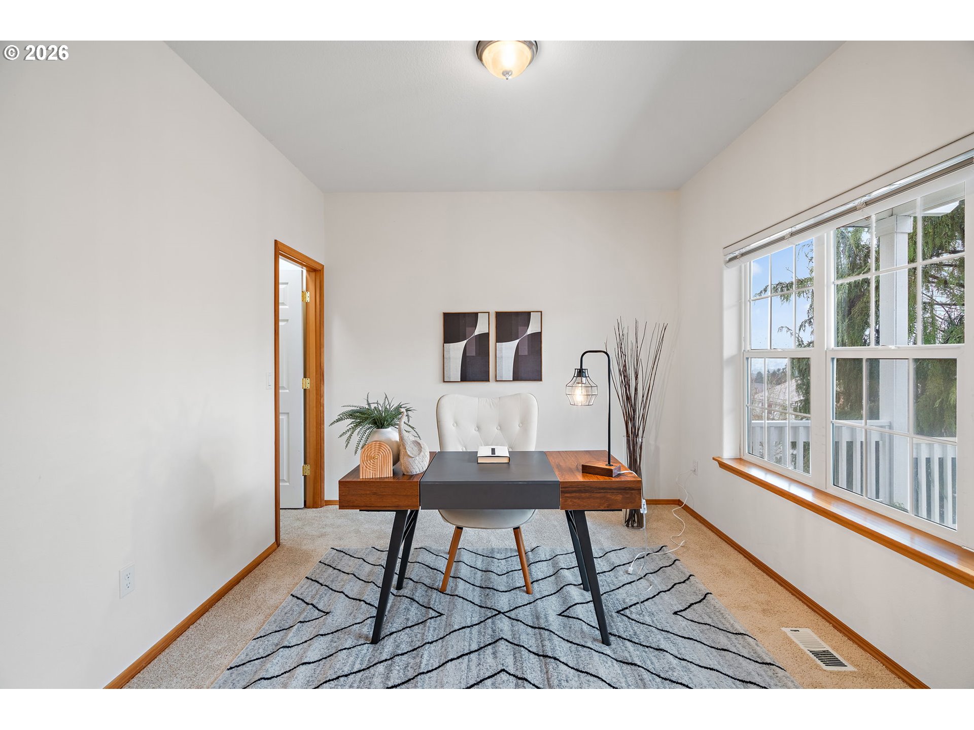 15460 Southwest 145th Terrace Tigard, OR 97224 - Photo 6 of 45 a workspace with furniture and a window