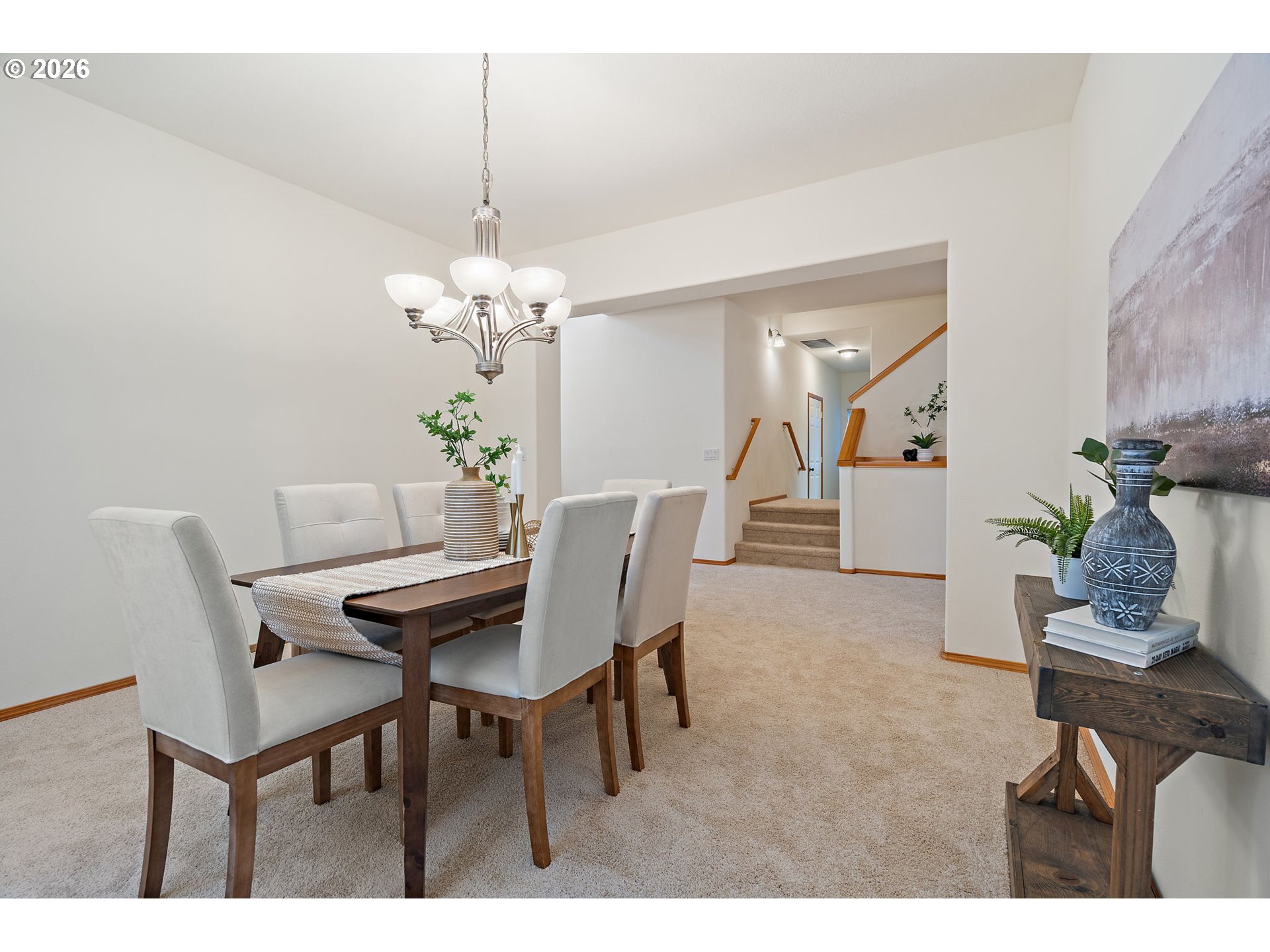 15460 Southwest 145th Terrace Tigard, OR 97224 - Photo 10 of 45 a dining room with furniture and chandelier