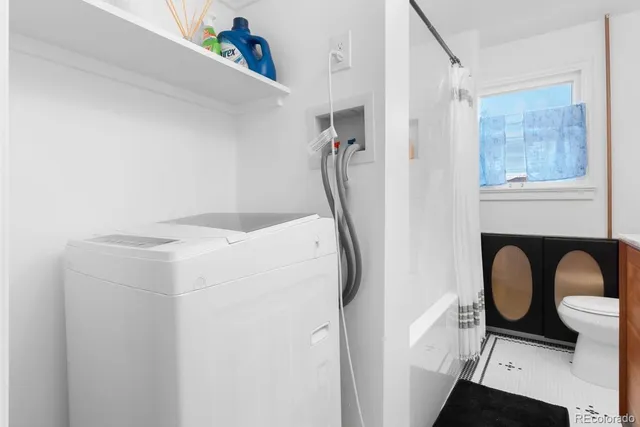 a utility room with dryer and washer