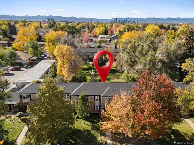 a view of swimming pool and an outdoor seating