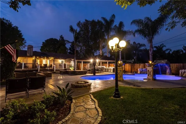 a view of a swimming pool with a patio