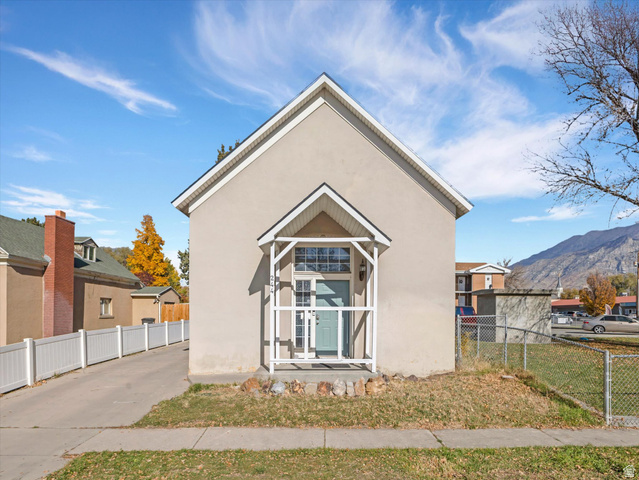 244 400 South Provo, UT 84601 - Photo 1 of 1 View of property exterior with stucco siding and a mountain view